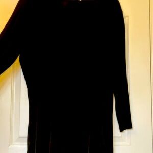 Units Tall XL separates, long sleeve black tunic with black leggings.